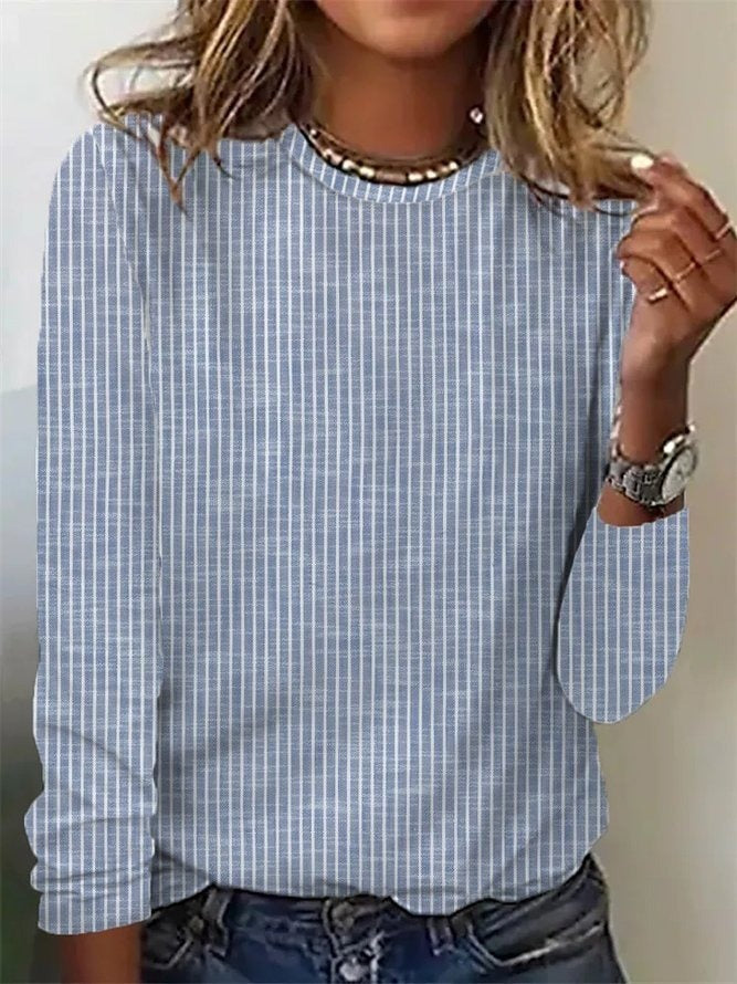 Blusa de rayas con cuello redondo y manga larga · Yanira