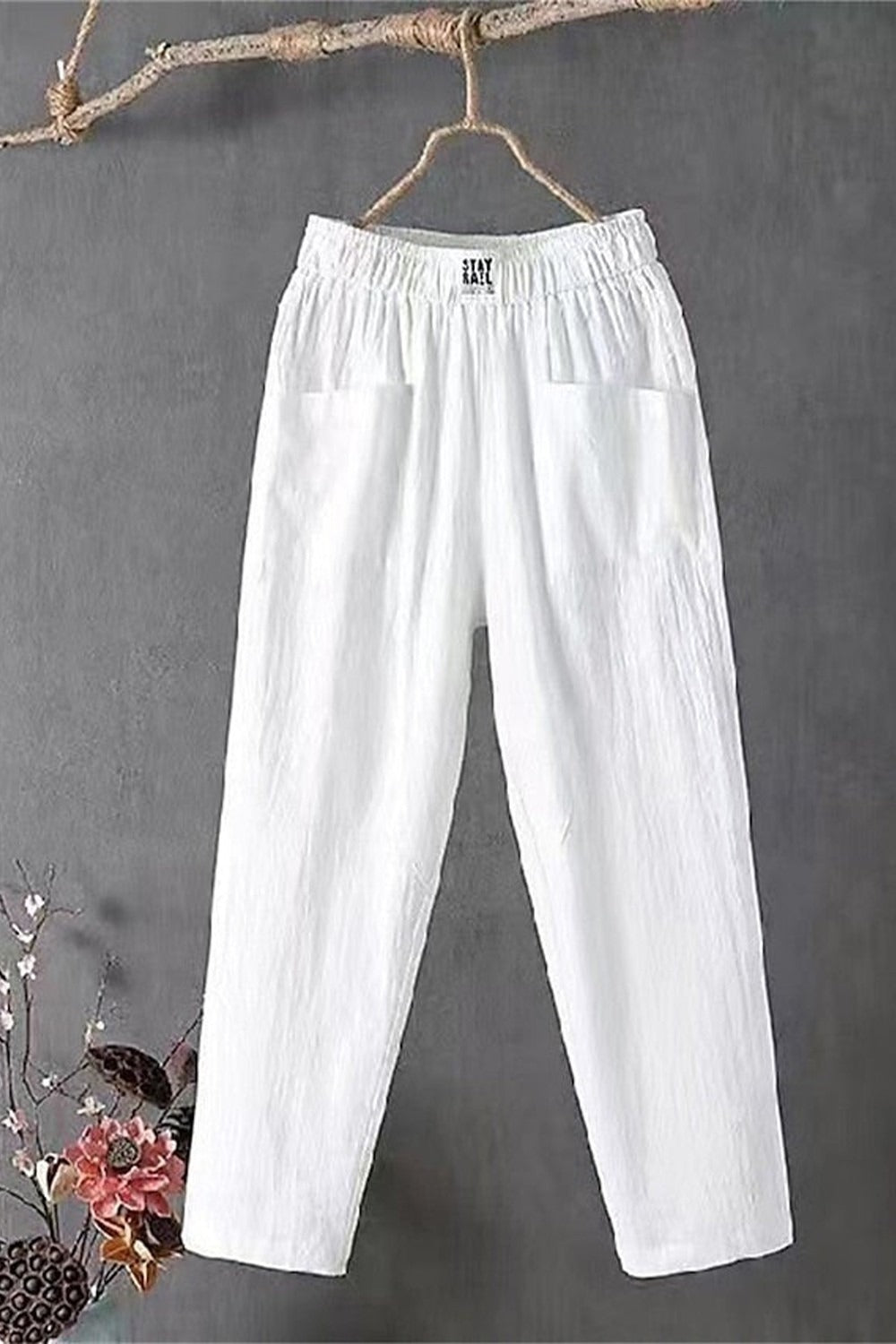 Pantalón suave cropped liso con cintura elástica y bolsillos