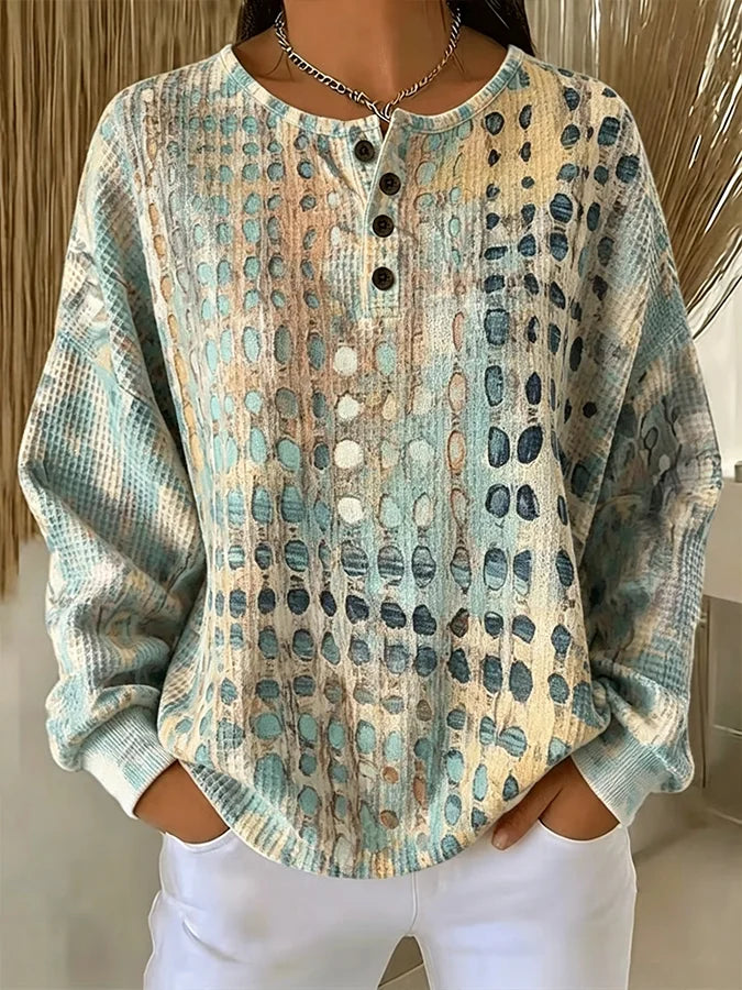 Sudadera abstracta de tejido gofre con cuello redondo y botones
