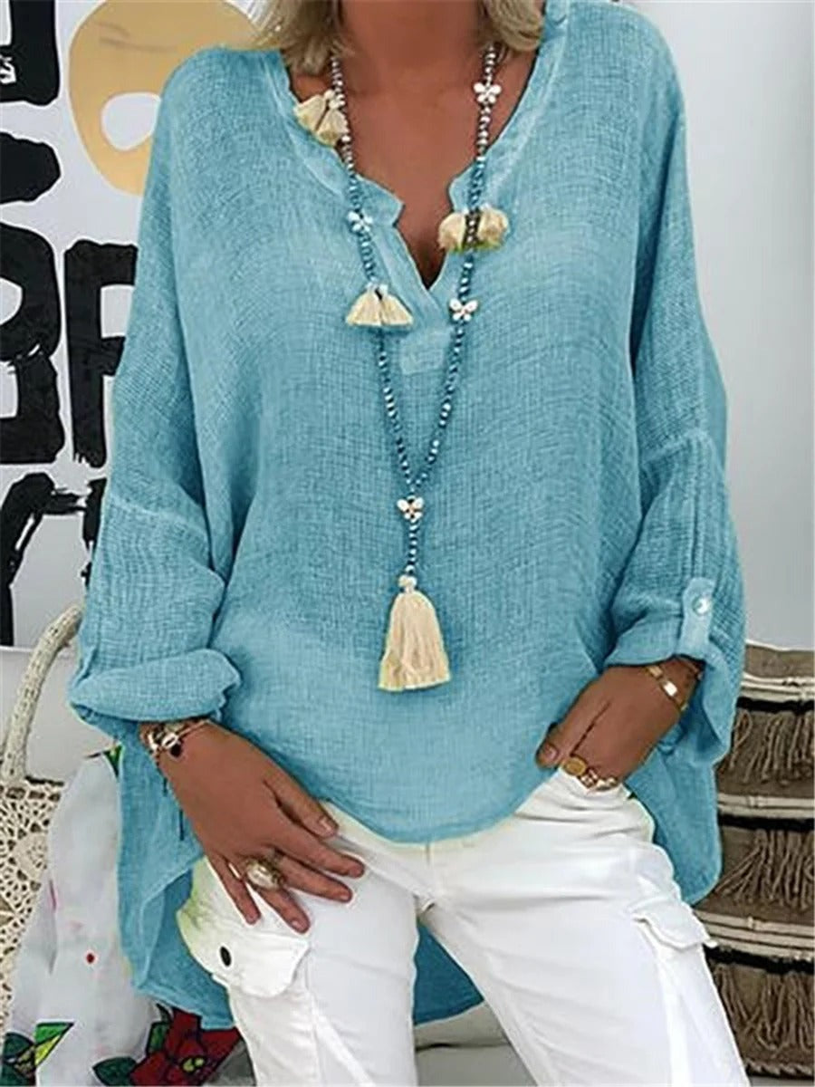 Blusa casual lisa de algodón con escote en pico y manga larga