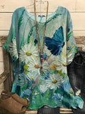 Blusa holgada de flores con cuello redondo y manga corta