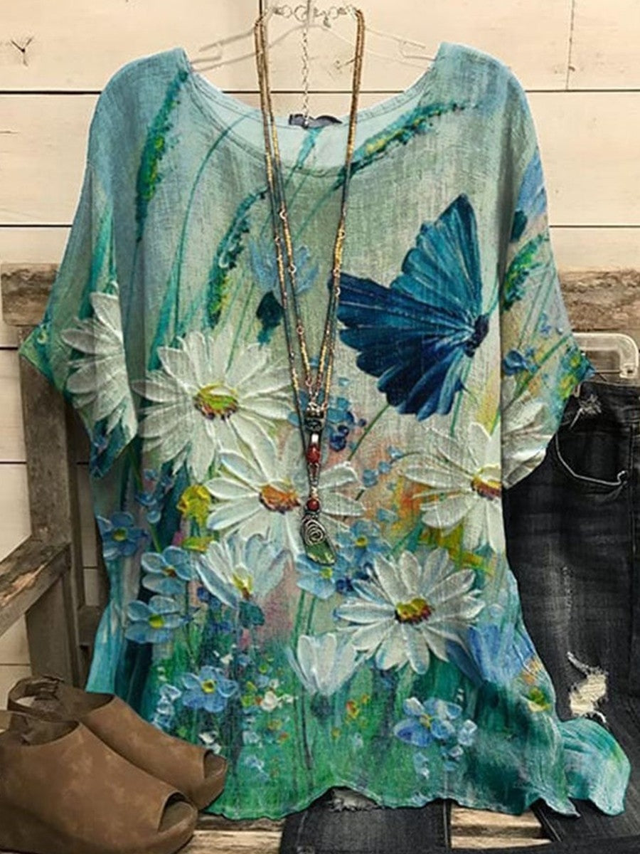 Blusa holgada de flores con cuello redondo y manga corta