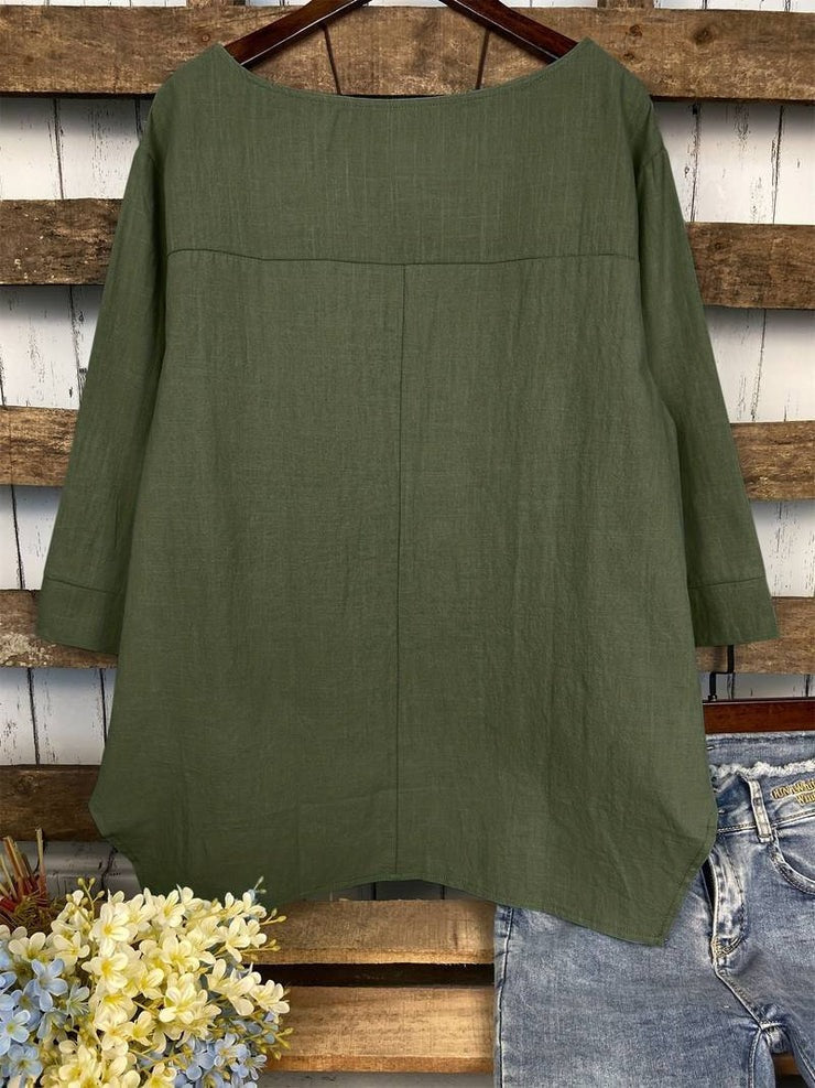Blusa lisa verde con cuello redondo y manga larga