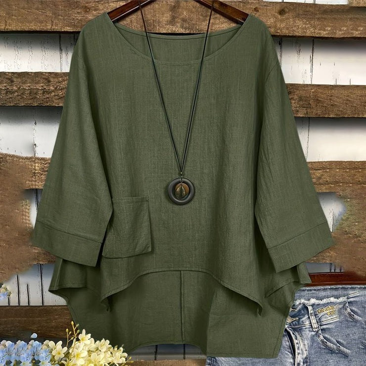 Blusa lisa verde con cuello redondo y manga larga