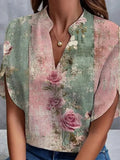 Top de flores rosa con escote en pico y manga corta