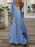 Vestido largo de flores de encaje azul con escote en pico y aplicaciones