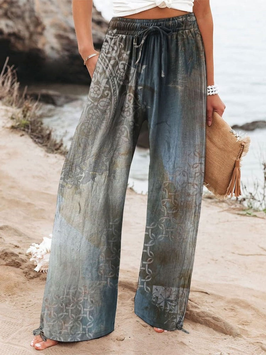 Pantalón elegante de pernera ancha de flores