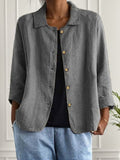 Camisa holgada lisa de algodón con cuello chal y hebilla
