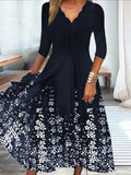 Vestido largo holgado de flores con escote en pico y manga tres cuartos