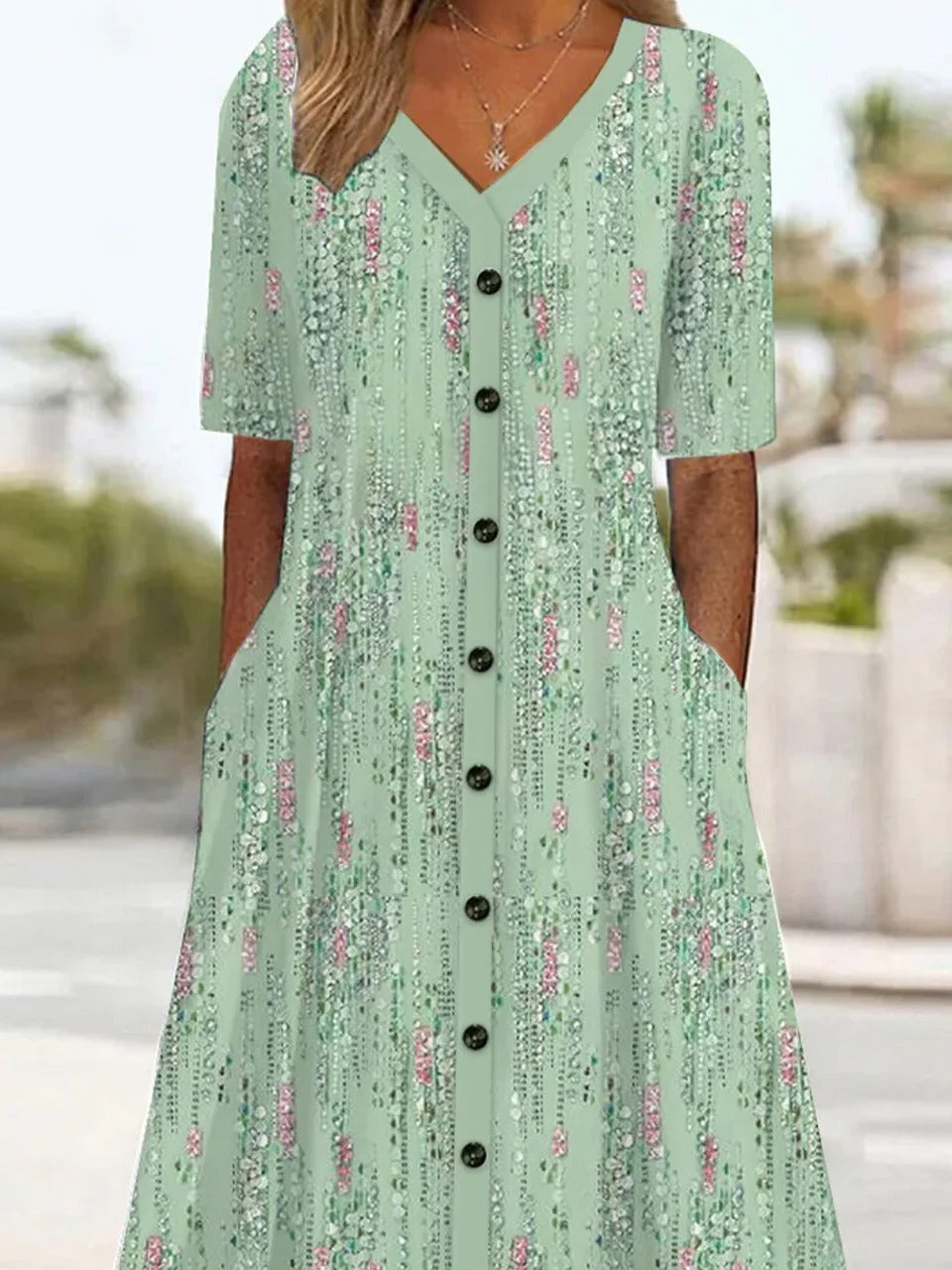 Vestido casual midi de flores verde con escote en pico y manga corta — foto 2