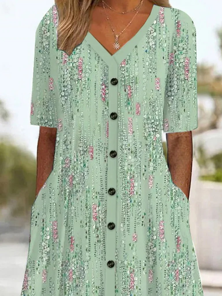 Vestido casual midi de flores verde con escote en pico y manga corta — foto 3