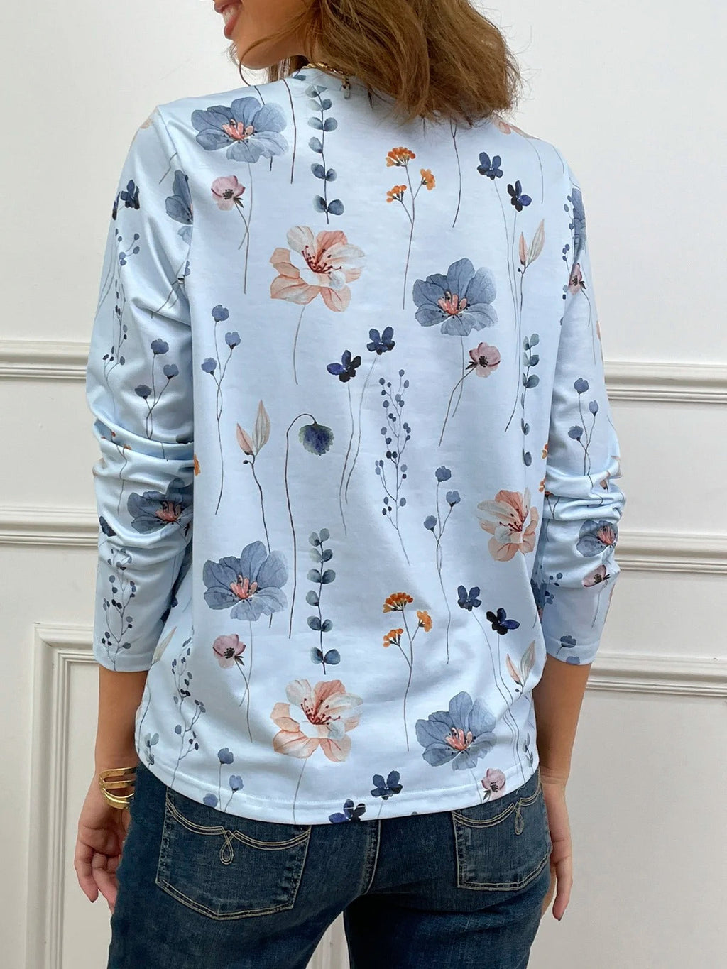 Blusa casual holgada de flores con cuello redondo y manga larga