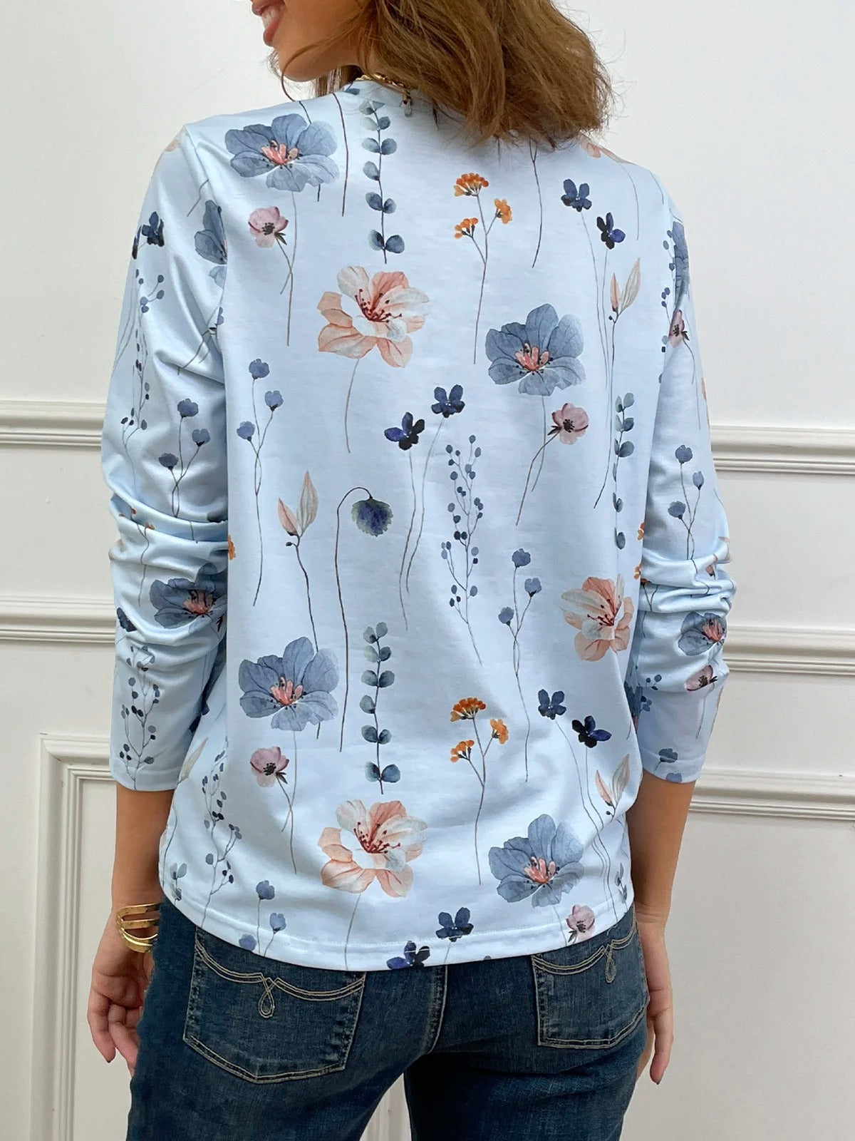 Blusa casual holgada de flores con cuello redondo y manga larga