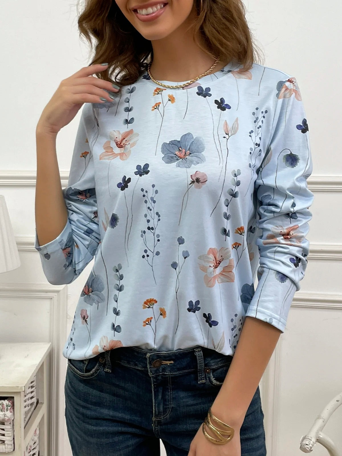 Blusa casual holgada de flores con cuello redondo y manga larga
