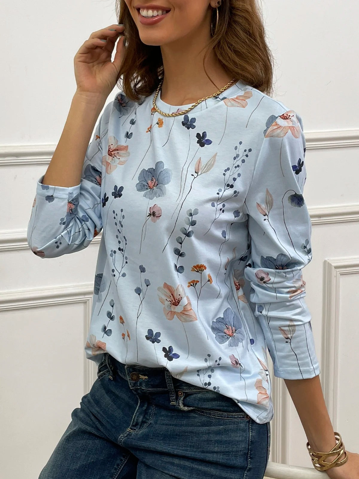 Blusa casual holgada de flores con cuello redondo y manga larga