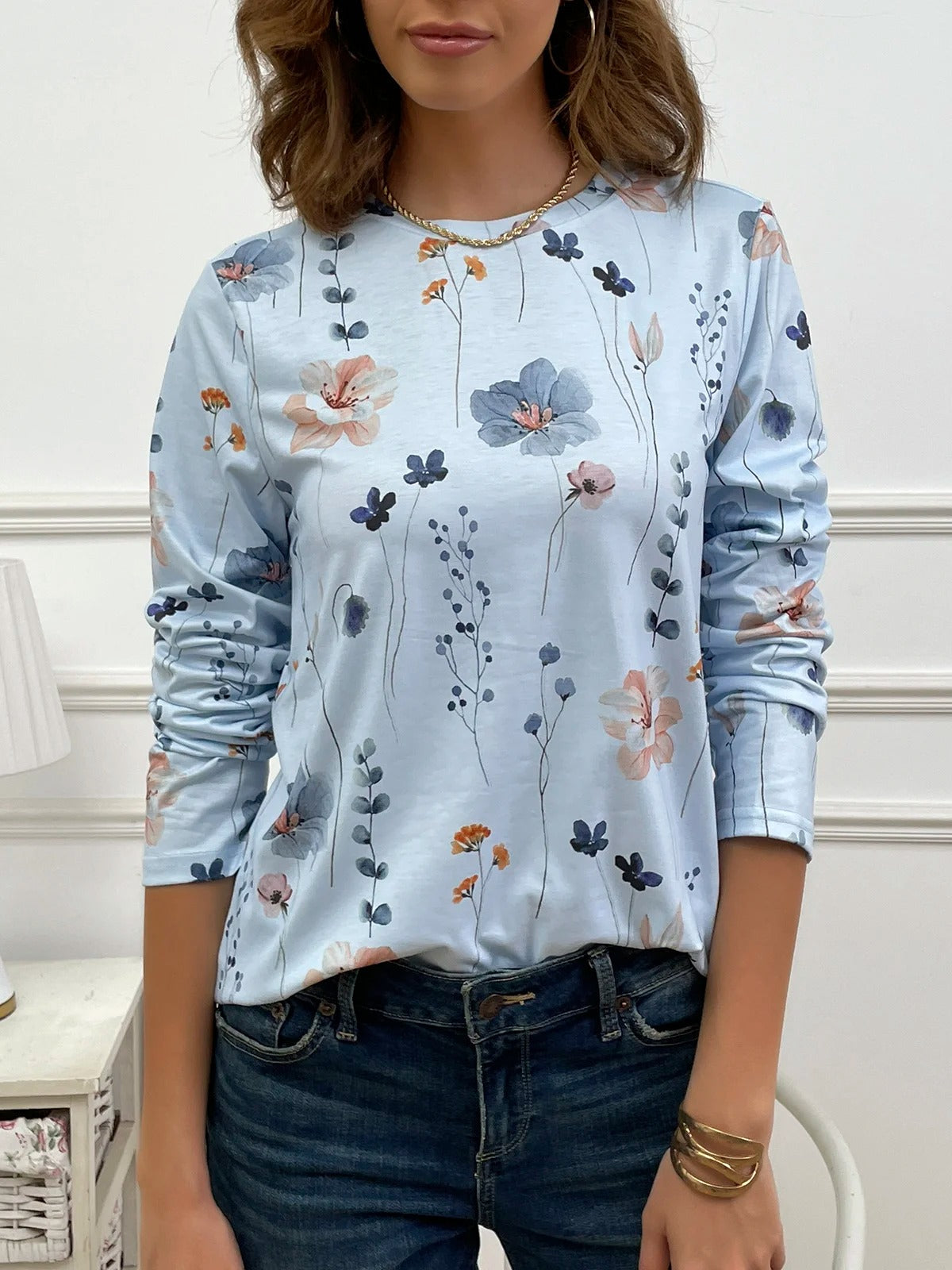 Blusa casual holgada de flores con cuello redondo y manga larga