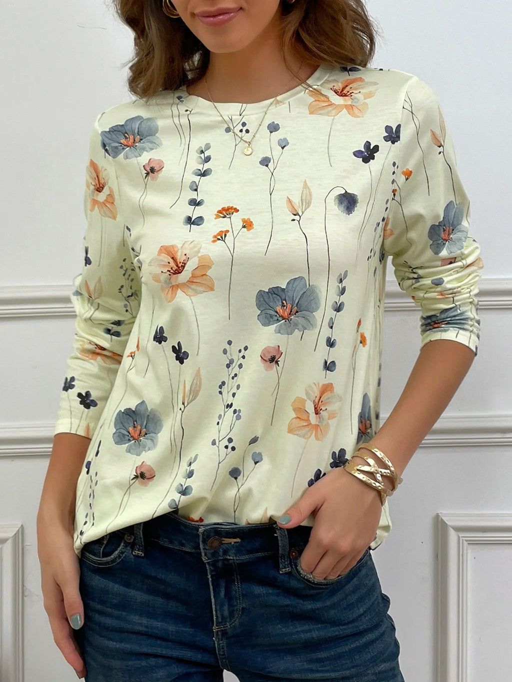 Blusa casual holgada de flores con cuello redondo y manga larga