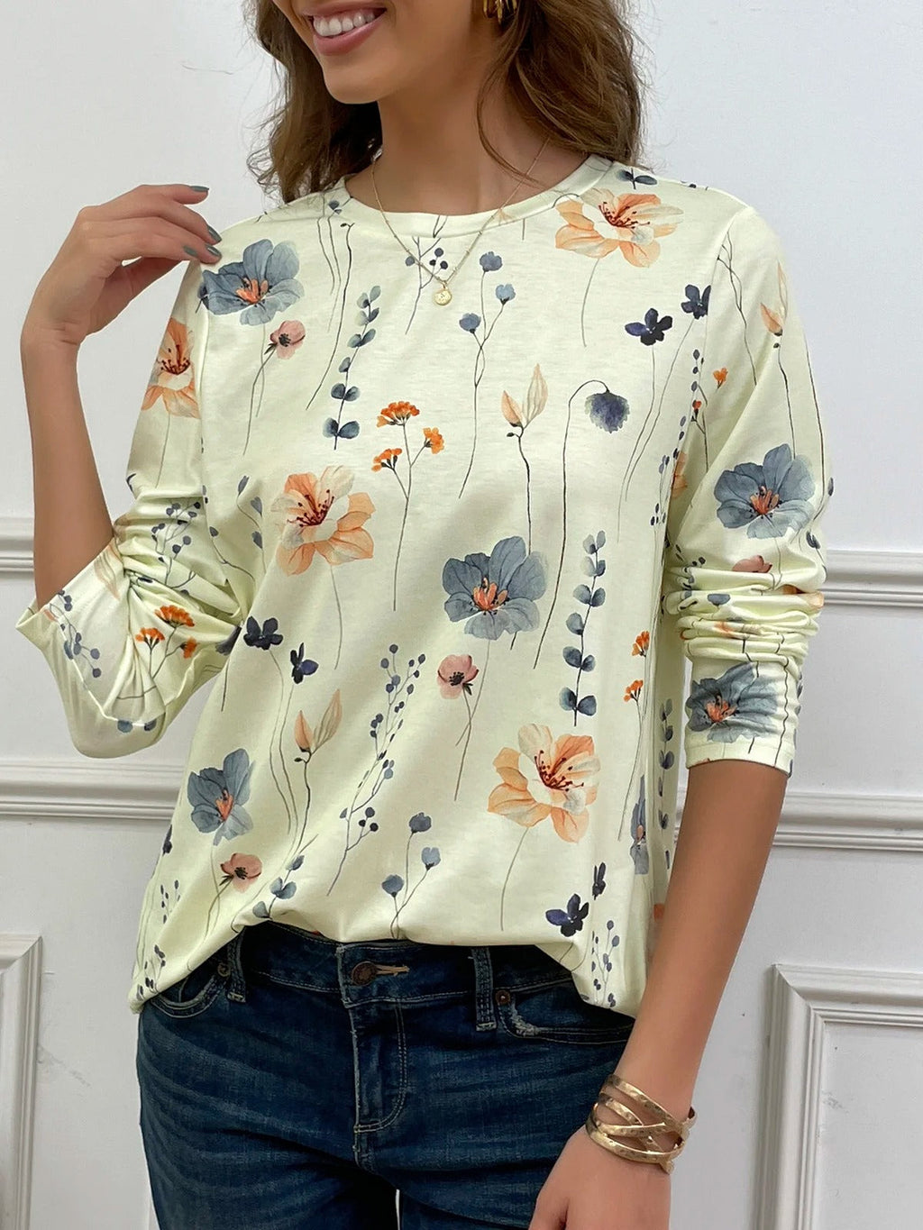 Blusa casual holgada de flores con cuello redondo y manga larga