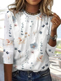 Blusa casual holgada de flores con cuello redondo y manga larga