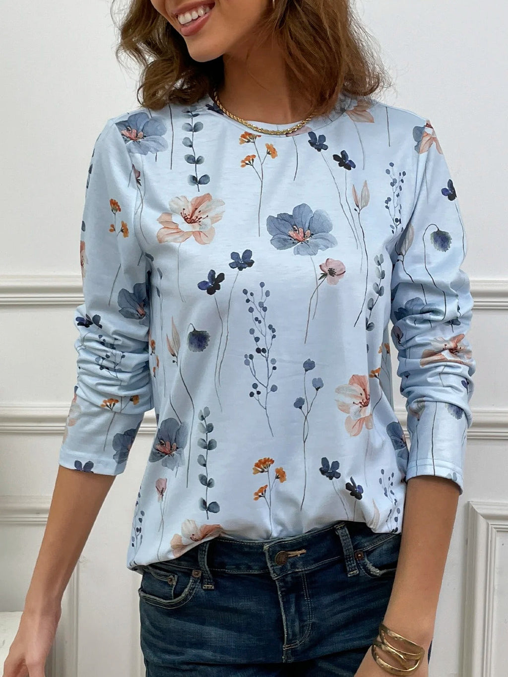 Blusa casual holgada de flores con cuello redondo y manga larga