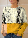 Jersey casual bicolor con cuello redondo y manga larga · Celia