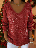 Jersey holgado con brillo con escote en pico