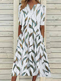 Vestido midi de hojas con escote en pico y manga francesa