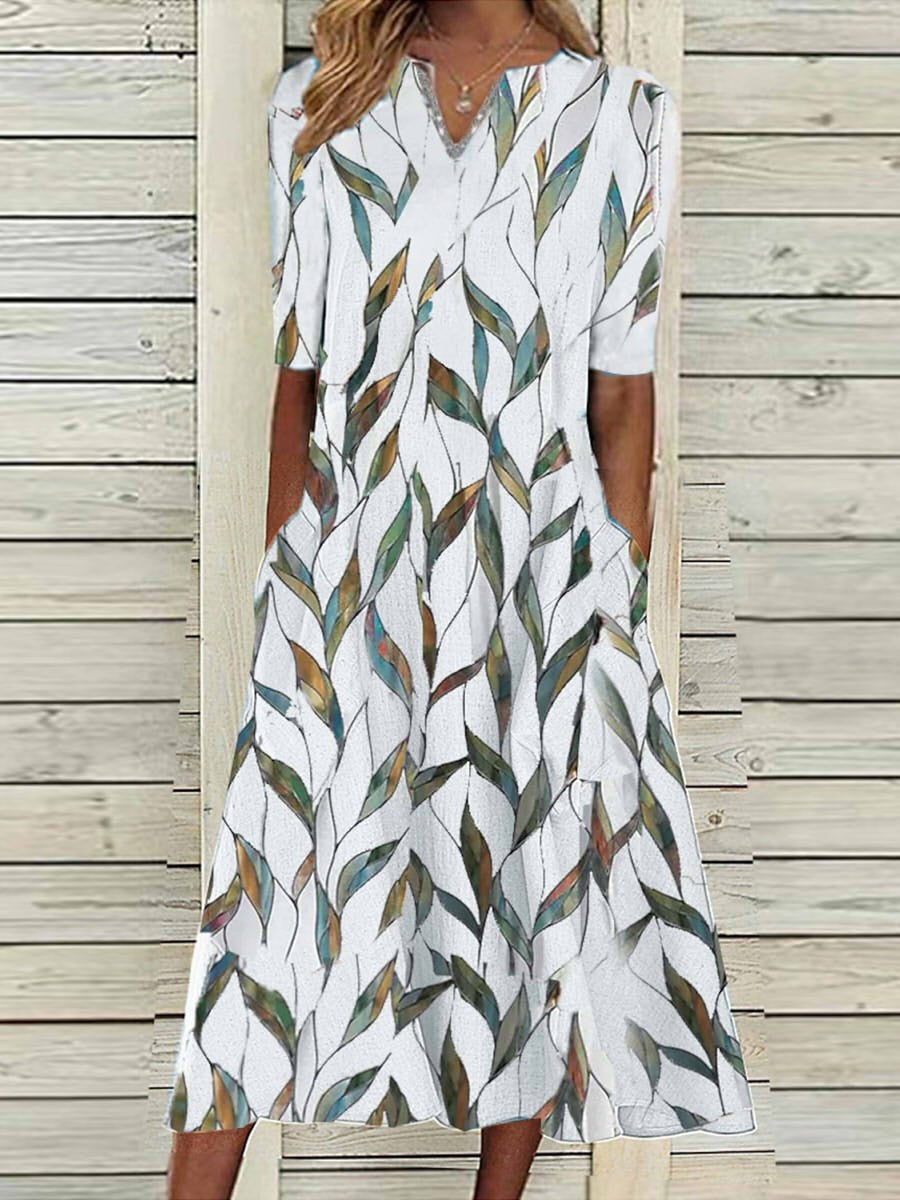 Vestido midi de hojas con escote en pico y manga francesa