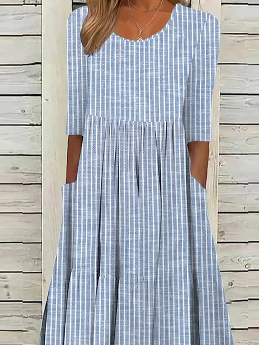 Vestido casual midi de rayas con cuello redondo y manga francesa — foto 4