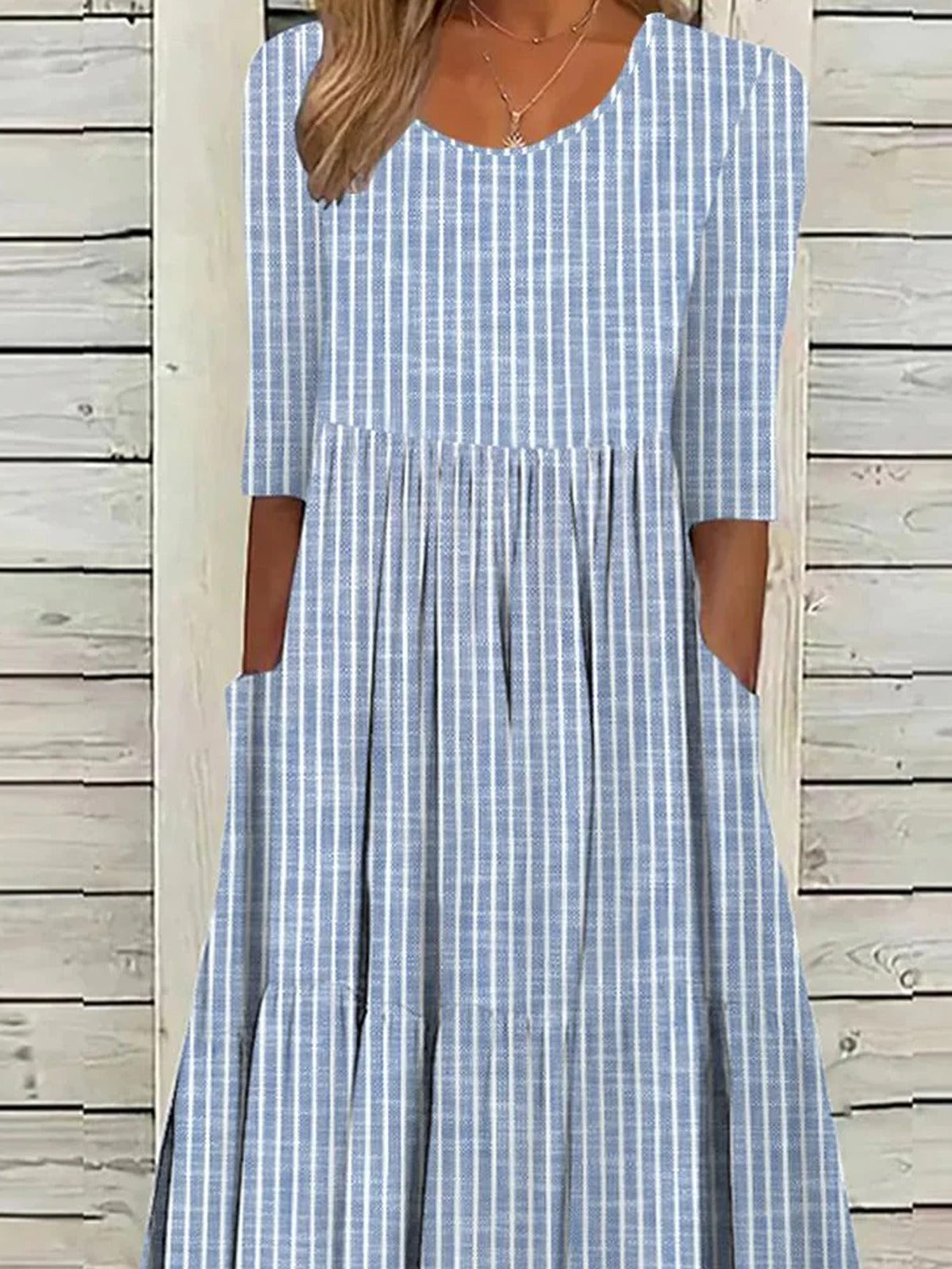 Vestido casual midi de rayas con cuello redondo y manga francesa — foto 4