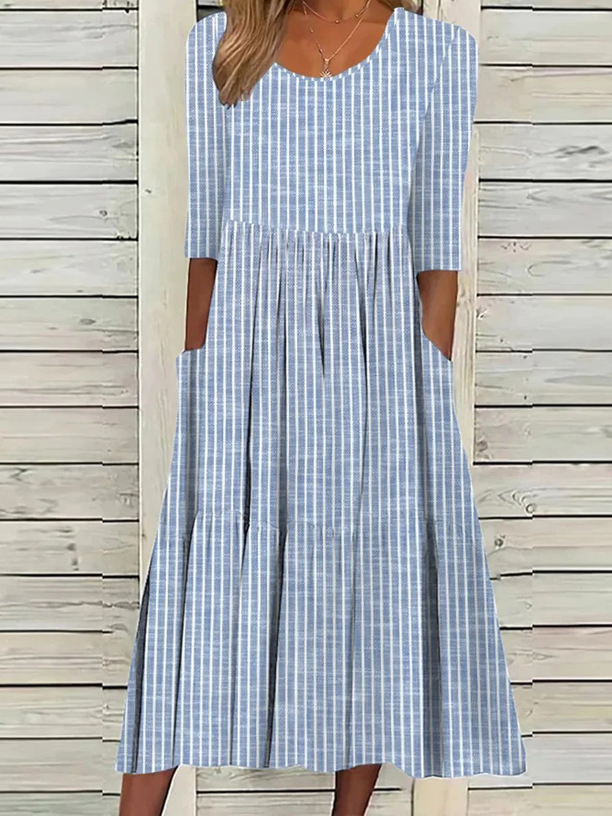 Vestido casual midi de rayas con cuello redondo y manga francesa