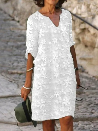 Vestido de flores de algodón con escote en pico y manga francesa