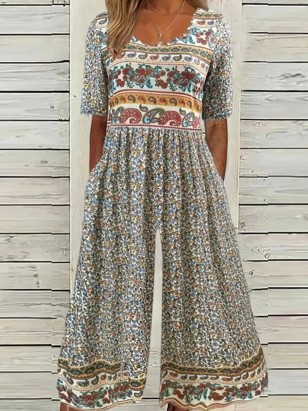 Mono de playa holgado de flores con cuello redondo y manga corta