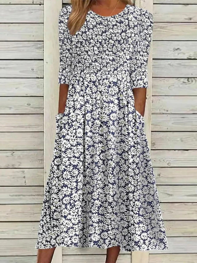 Vestido midi de margaritas azul marino con bolsillos