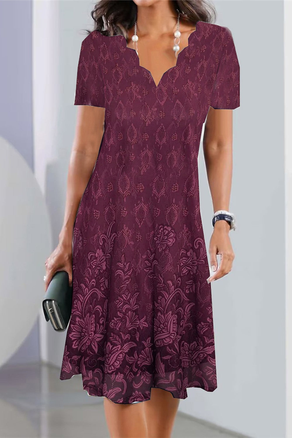 Vestido midi de flores con manga corta