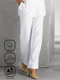 Pantalón casual holgado liso con bolsillos · Kenia
