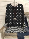 Camisa de lunares con cuello redondo y manga larga
