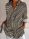 Camisa holgada abstracta con cuello camisero, manga larga y botones · Alena