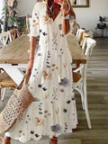 Vestido largo holgado de flores con escote en pico y manga francesa · Hilda