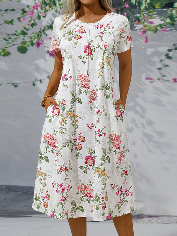 Vestido midi holgado de flores con cuello redondo y manga corta