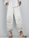 Pantalón holgado de flores de encaje