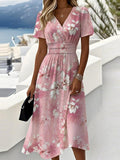 Vestido midi de flores rosa con escote en pico y manga corta