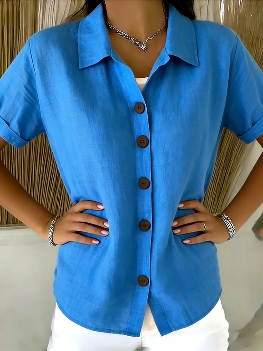 Camisa básica con cuello camisero y manga corta — foto 7