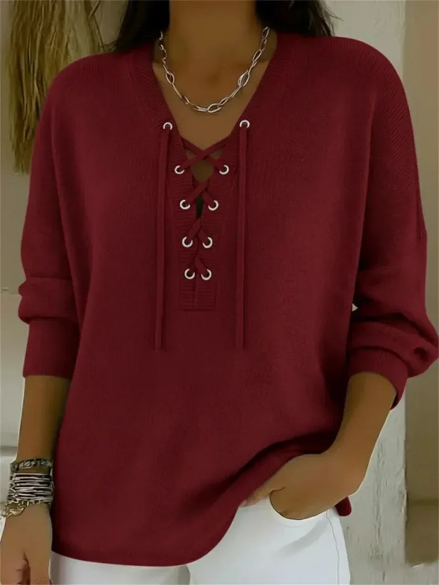 Jersey casual liso con escote en pico, manga larga y nudo delantero