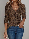 Camisa vintage holgada de leopardo con escote en pico y manga larga