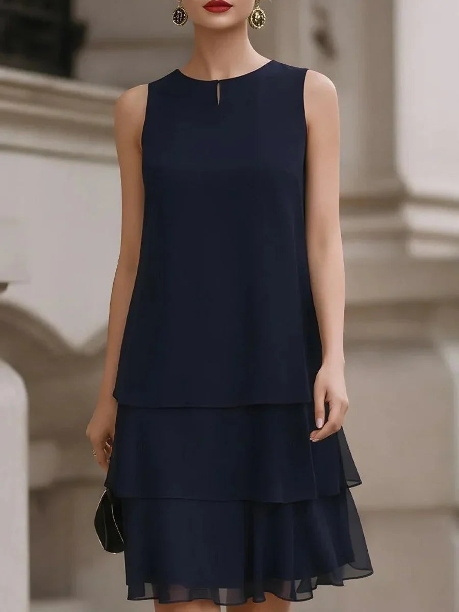 Vestido corto de volantes de gasa con cuello redondo, sin mangas