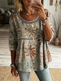 Blusa vintage de flores con cuello redondo · Cala