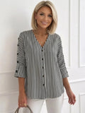 Blusa de rayas negra con escote en pico