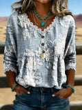 Blusa de flores con escote en pico