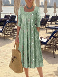 Vestido midi verde con escote cuadrado y manga larga